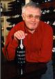 Photograph of Trevor Hughes with a vintage port.  Click for a larger image.